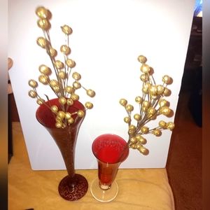 Pair of red glass bud vases with gold floral